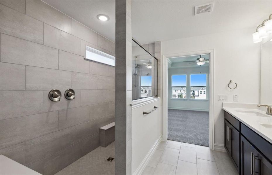 Oversized tub in owner's bathroom*real home pictured