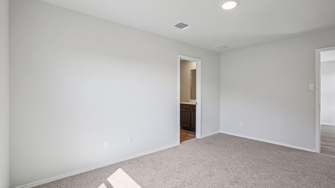 A spacious room offers comfortable carpeting, ready for personalization. A spacious room offers comfortable carpeting, ready for personalization.
