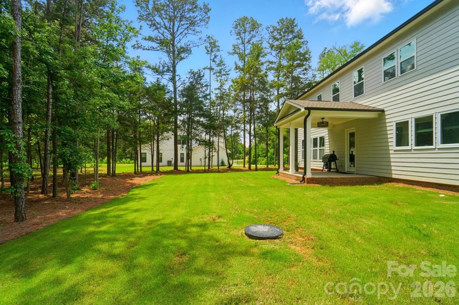 Exterior details and patio area of a home in Fairview Forest, Indian Trail (Image 27).