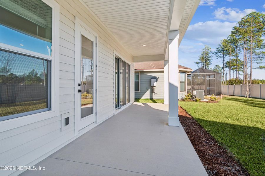 Exterior details and patio area of a home in Crosswinds 40’, Ponte Vedra (Image 3). Exterior details and patio area of a home in Crosswinds 40’, Ponte Vedra (Image 3).