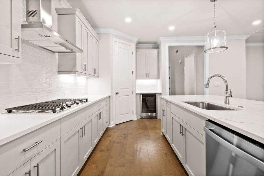 Representative furnished interior of a home built from the The McIntosh by The Providence Group in Promenade at Sawnee Village, Cumming (Image 9).