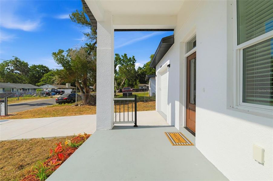 Exterior details and patio area of a home in , Dade City (Image 3).