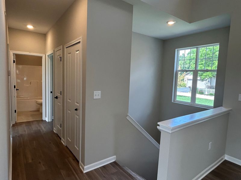 Spacious, unfurnished interior of a new home in Mystic Ridge, Whitmore Lake (Image 56).