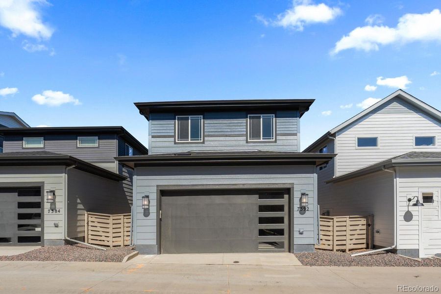 Exterior details and patio area of a home in The Villas Collection at Sterling Ranch, Littleton (Image 1).