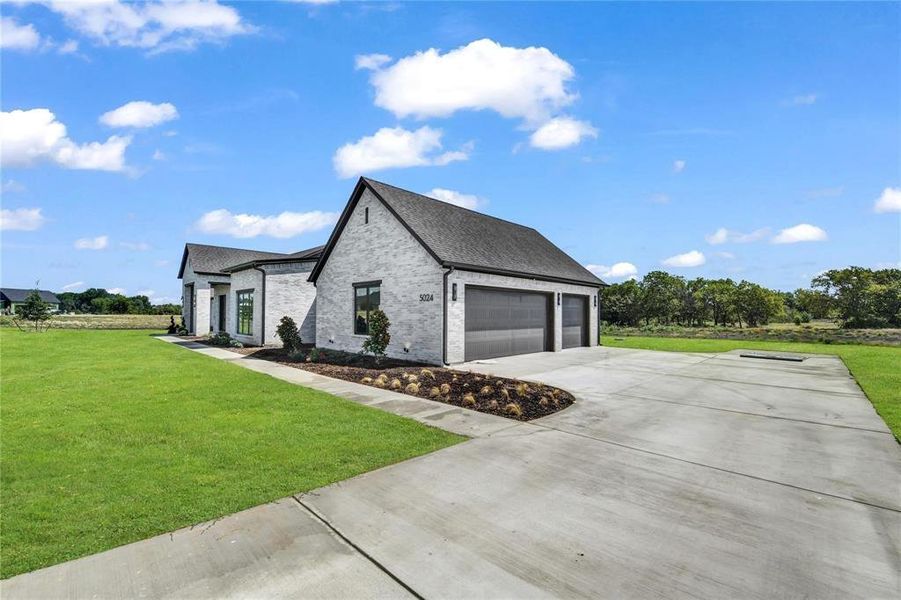 Front exterior of a new home in , Aledo, TX, highlighting curb appeal (Image 25).