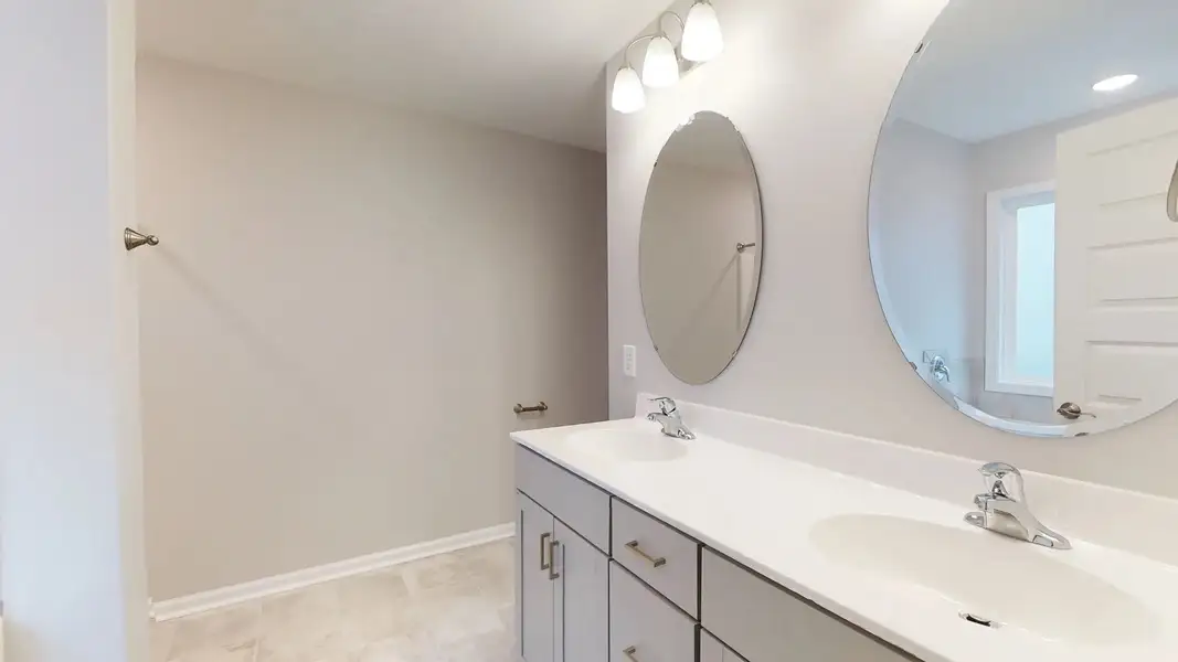 Representative furnished interior of a home built from the Kids 2 Car by JC Jackson Homes,LLC in Heritage Pointe, Newport (Image 4).