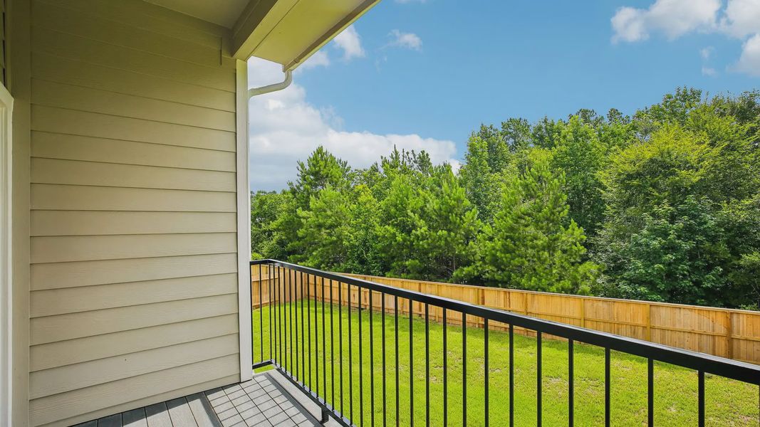 Exterior details and patio area of a home in Woodforest, Montgomery (Image 3).