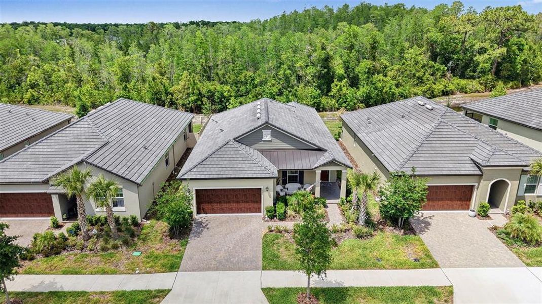 Front exterior of a new home in , Land O' Lakes, FL, highlighting curb appeal (Image 22).