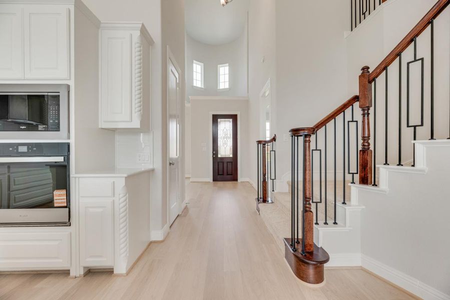 Representative unfurnished interior of a home built from the Royal Martinique by Grand Homes in Prairie Ridge, Venus (Image 11). Representative unfurnished interior of a home built from the Royal Martinique by Grand Homes in Prairie Ridge, Venus (Image 11).