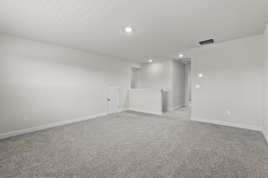 Spacious, unfurnished interior of a new home in Waterside - Coastline Series, Longs (Image 32).