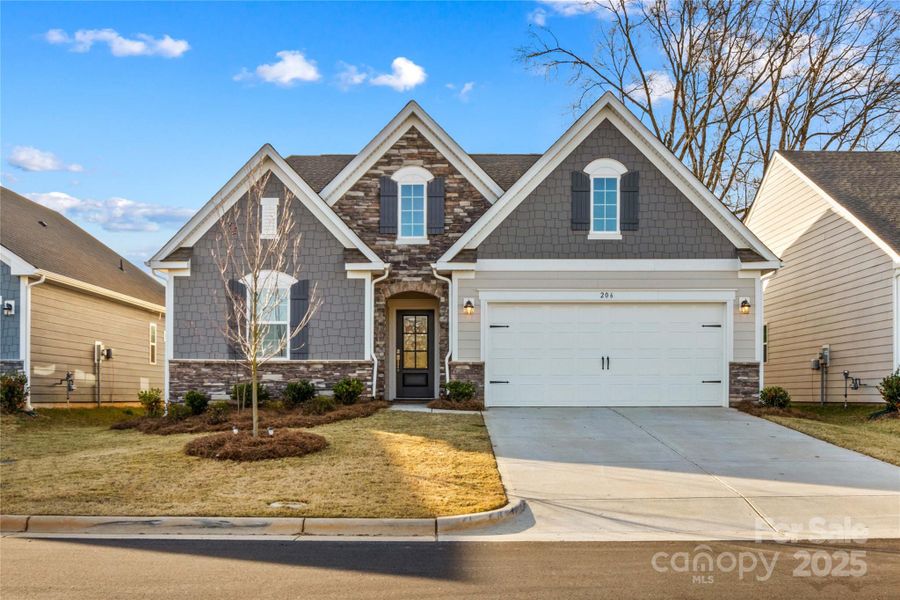 Front exterior of a new home in , Statesville, NC, highlighting curb appeal (Image 1). Front exterior of a new home in , Statesville, NC, highlighting curb appeal (Image 1).