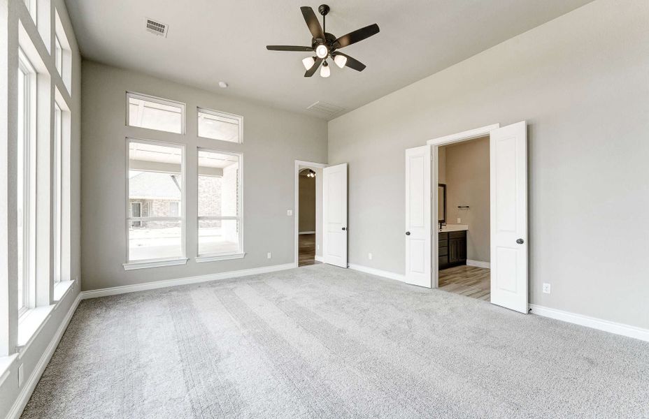 Representative unfurnished interior of a home built from the 2870 by Ravenna Homes in The Woodlands Hills 65′, Willis (Image 29). Representative unfurnished interior of a home built from the 2870 by Ravenna Homes in The Woodlands Hills 65′, Willis (Image 29).