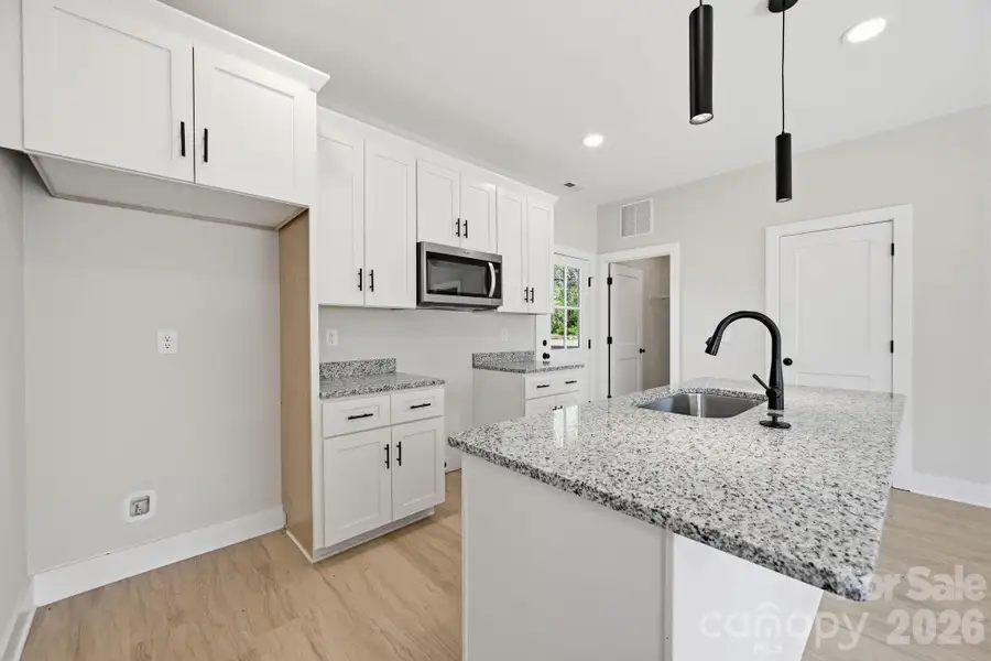 Furnished interior view inside a new home in , Albemarle (Image 3).