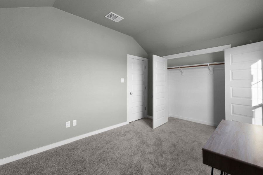 Ample closet space and new carpet define this quiet sleeping sanctuary.