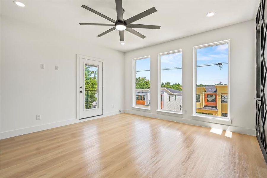 Unfurnished room featuring light wood-type flooring, recessed lighting, and a ceiling fan