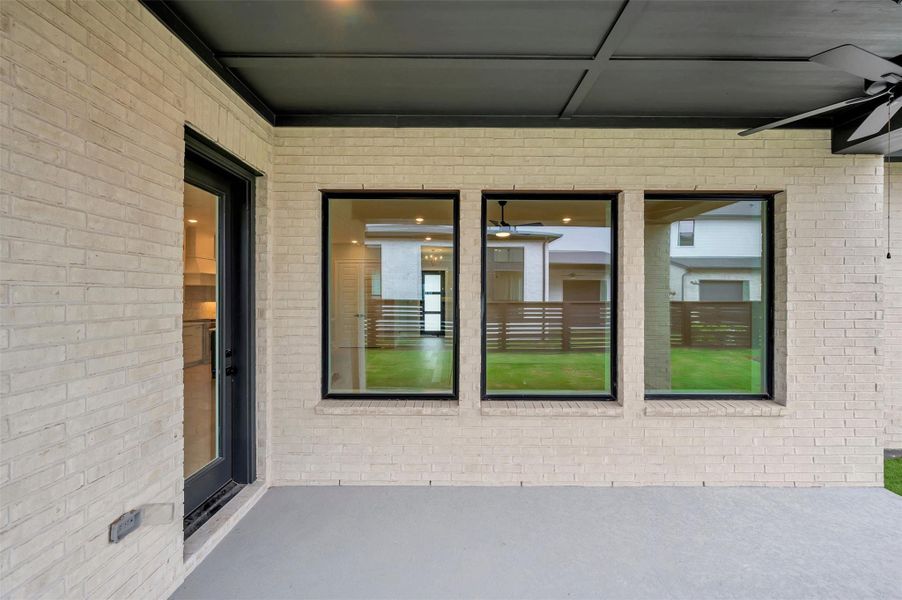 Exterior details and patio area of a home in Easthaven at Bridgeland Central - Horizon Collection, Cypress (Image 22). Exterior details and patio area of a home in Easthaven at Bridgeland Central - Horizon Collection, Cypress (Image 22).