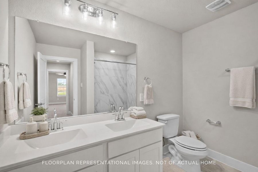 Furnished interior view inside a new home in Sorella, Tomball (Image 9).