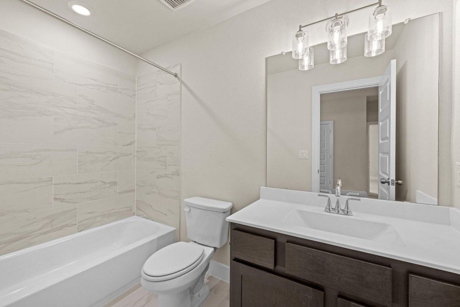 Furnished interior view inside a new home in Parmer Ranch, Georgetown (Image 9).