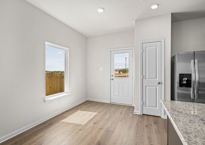 The dining area sits adjacent to the kitchen.