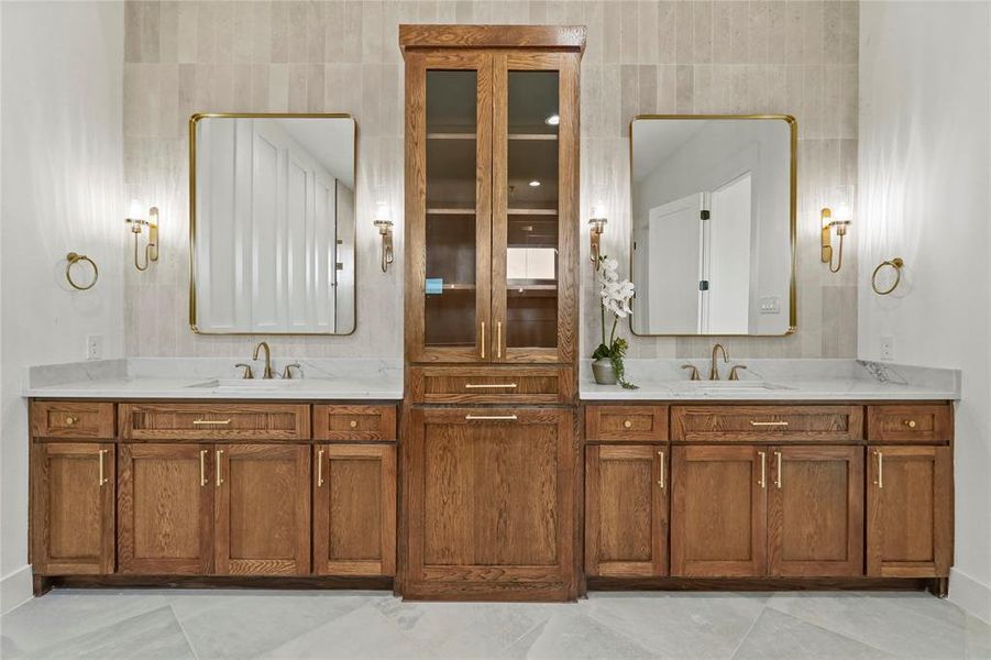 Full bath with double vanity and tile walls Full bath with double vanity and tile walls