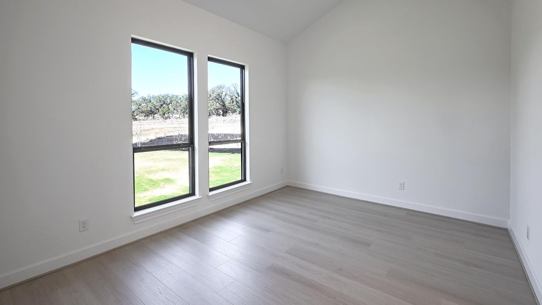 Spacious, unfurnished interior of a new home in The Preserve at Elm Creek, New Braunfels (Image 14).