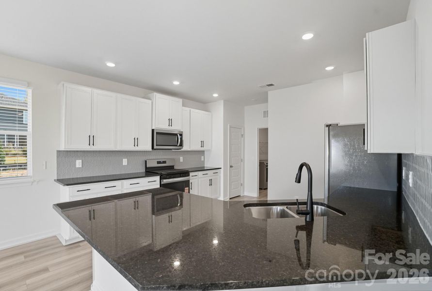 Furnished interior view inside a new home in Bellina, York (Image 13).