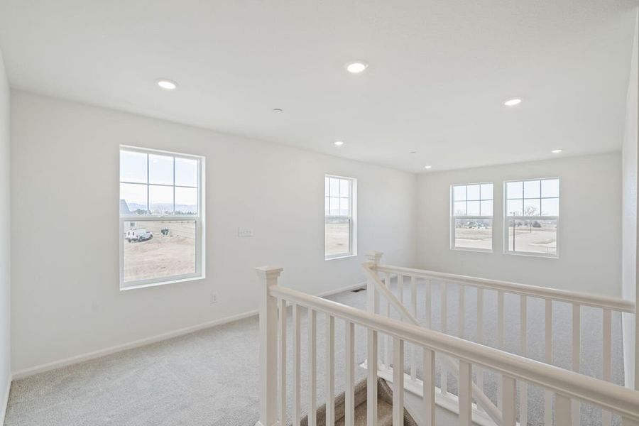 Spacious, unfurnished interior of a new home in The Nest Reserve at Canyon Creek, Erie (Image 16).