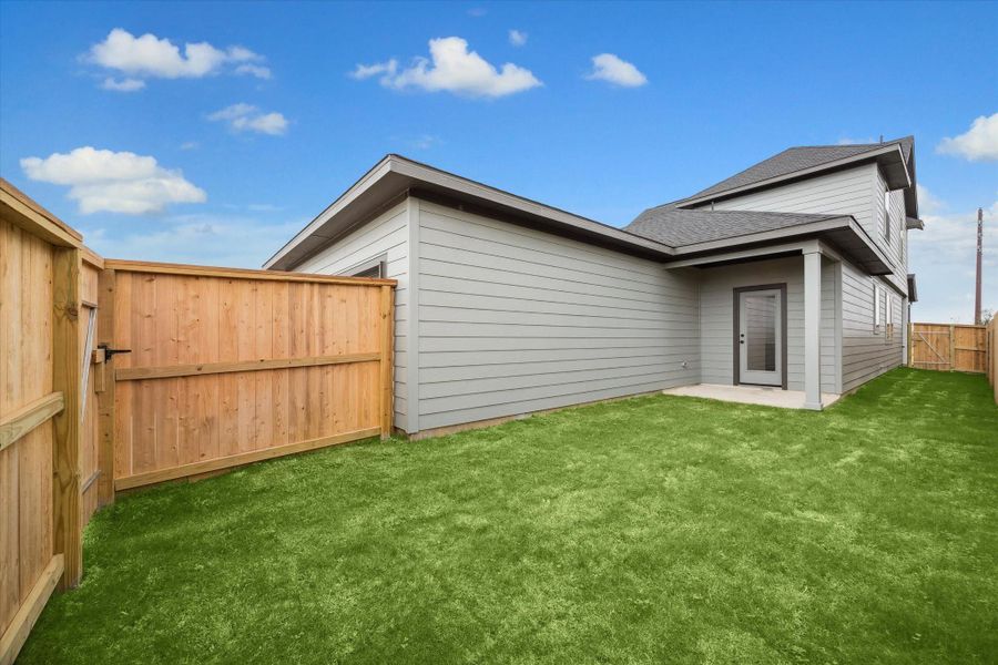 Exterior details and patio area of a home in Elyson, Katy (Image 4).