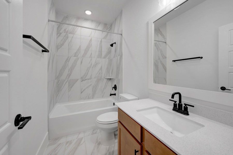 Furnished interior view inside a new home in Lone Star Landing, Montgomery (Image 14).