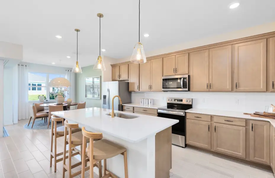 Representative furnished interior of a home built from the Concord by DiVosta in Emerson Oaks, Vero Beach (Image 5).