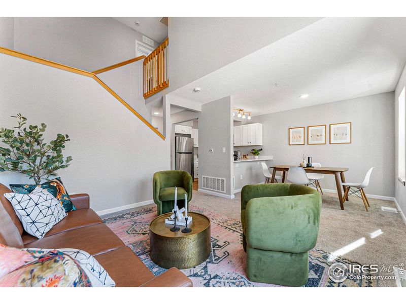 The open floor plan connecting the living room, dining room and kitchen makes entertaining easy.