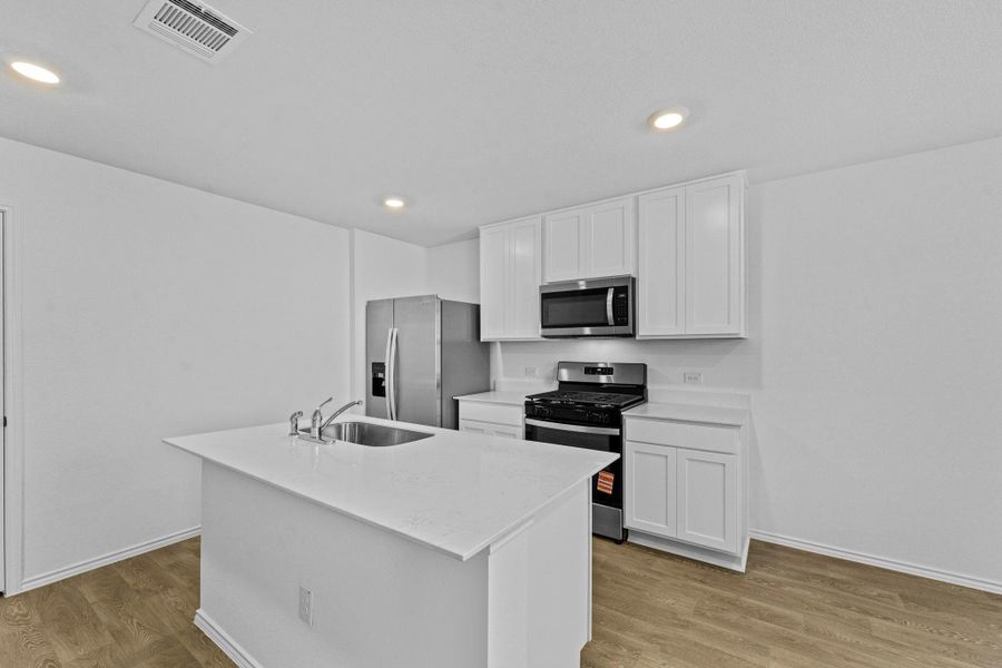 Furnished interior view inside a new home in Prairie Lakes, Buda (Image 9).
