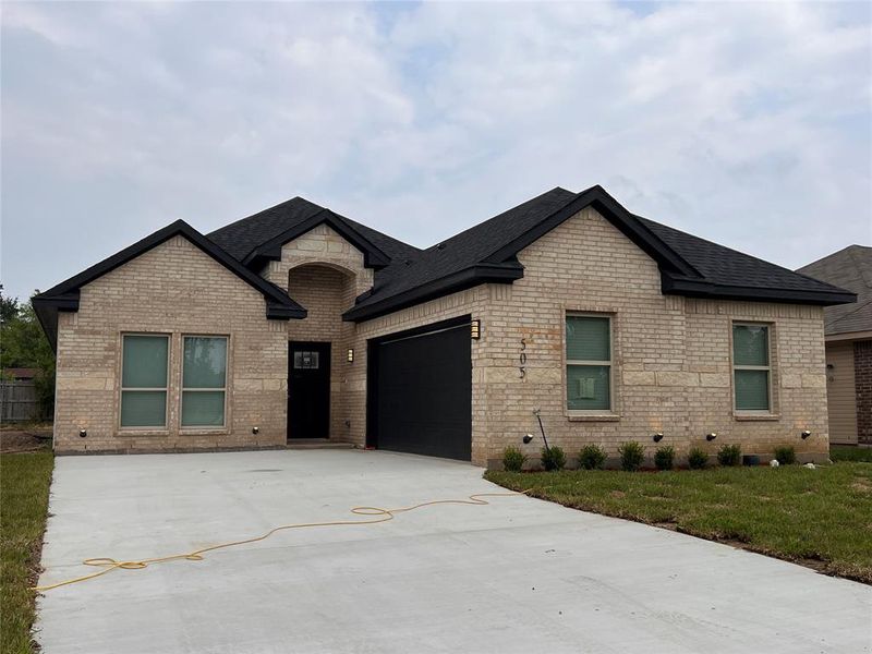 Front exterior of a new home in , Kaufman, TX, highlighting curb appeal (Image 1). Front exterior of a new home in , Kaufman, TX, highlighting curb appeal (Image 1).