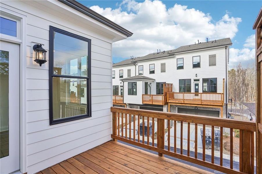 Exterior details and patio area of a home in Palisades Townhomes, Cumming (Image 4).