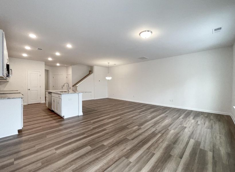 Spacious, unfurnished interior of a new home in East Main Townes, Spartanburg (Image 12).