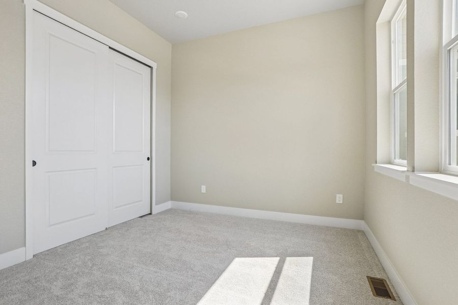 Spacious, unfurnished interior of a new home in Jackson Creek North, Monument (Image 54).