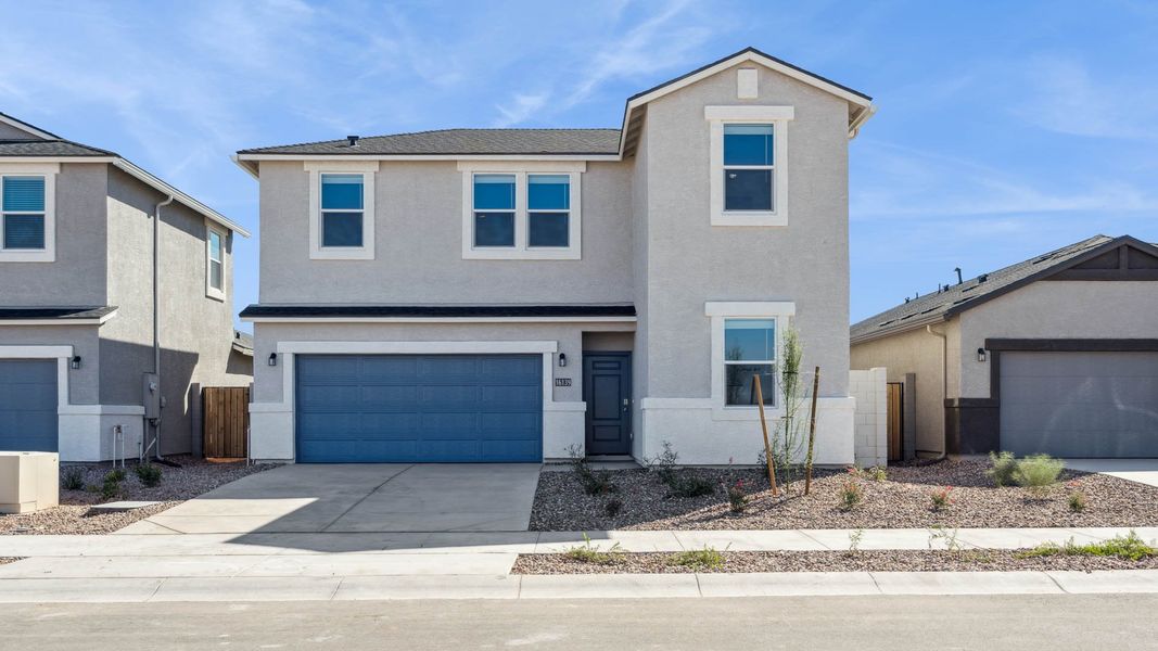 Representative exterior photo of a completed home built from the Ibis by D.R. Horton in Elena Trails, Maricopa, AZ (Image 19).