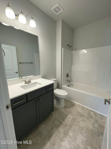 Furnished interior view inside a new home in Wood Creek, Leland (Image 8).