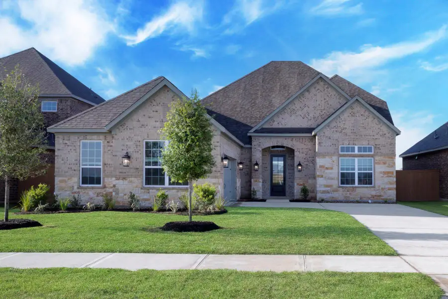 Front exterior of a new home in , Iowa Colony, TX, highlighting curb appeal (Image 1). Front exterior of a new home in , Iowa Colony, TX, highlighting curb appeal (Image 1).