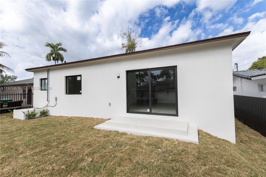Exterior details and patio area of a home in , Miami (Image 3).