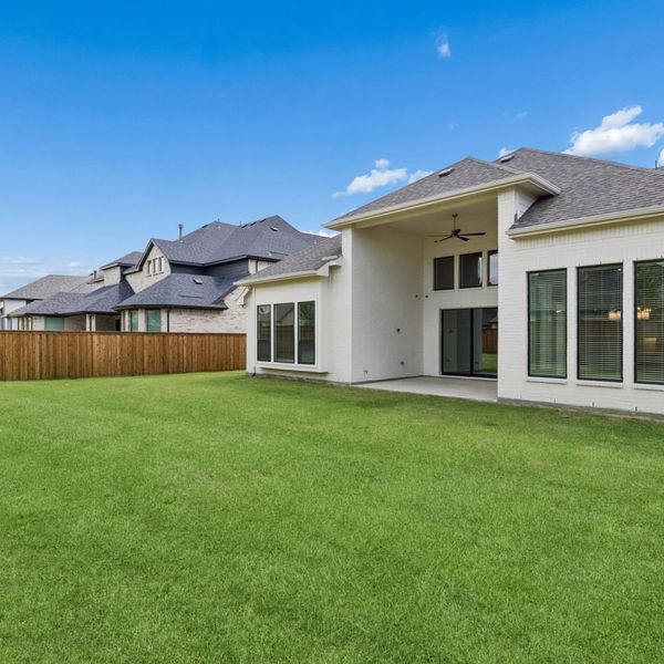 Exterior details and patio area of a home in Mosaic – 70′ Lots, Prosper (Image 30).