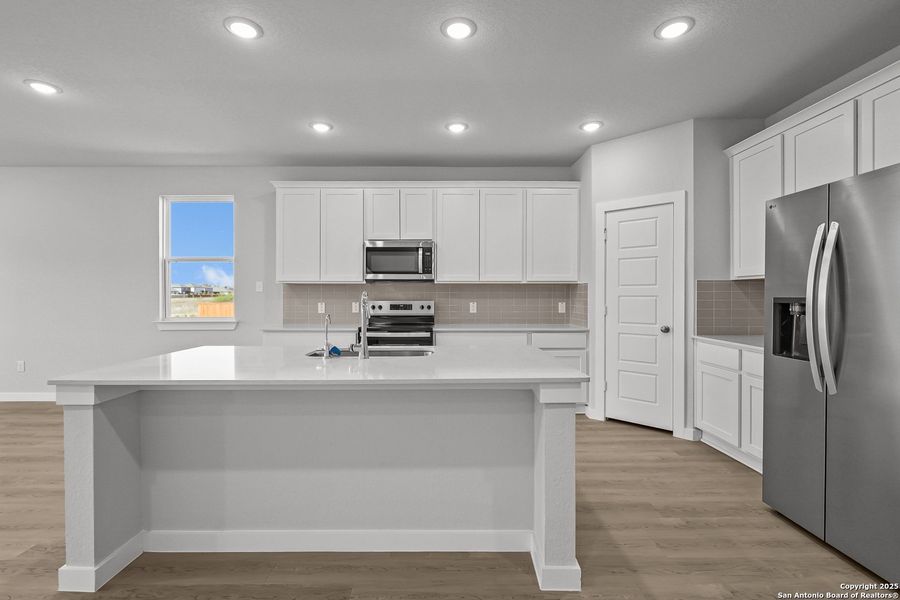 Furnished interior view inside a new home in Cinco Lakes, San Antonio (Image 16).