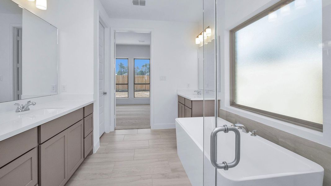 Furnished interior view inside a new home in The Highlands, Porter (Image 8).