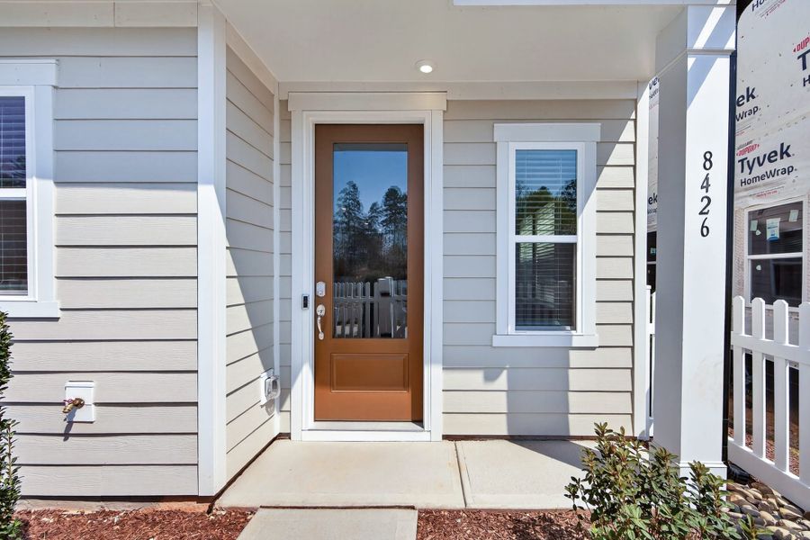 Exterior details and patio area of a home in Ellis Townes, Charlotte (Image 3). Exterior details and patio area of a home in Ellis Townes, Charlotte (Image 3).