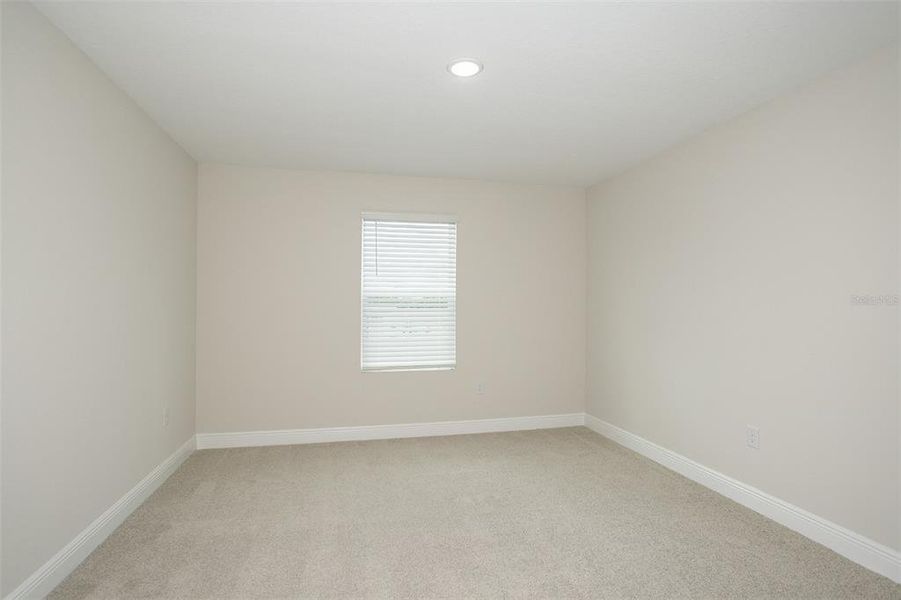 Spacious, unfurnished interior of a new home in Pasadena Woods, Dade City (Image 22).