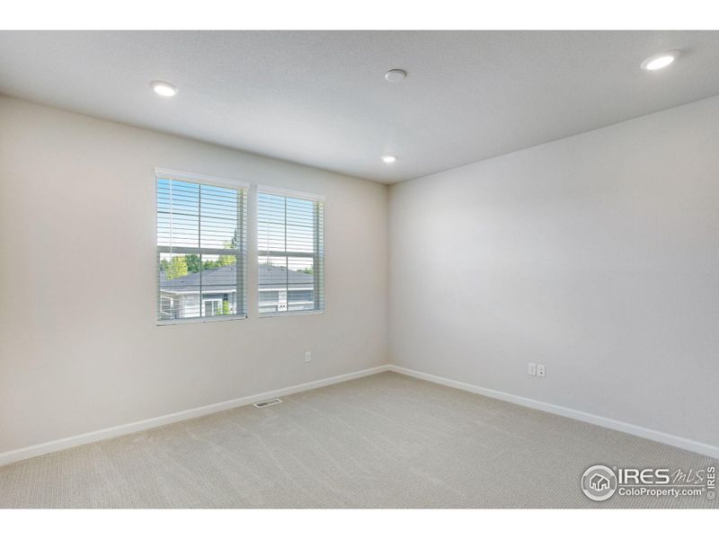Spacious, unfurnished interior of a new home in Westside Crossing Townhomes, Berthoud (Image 19).