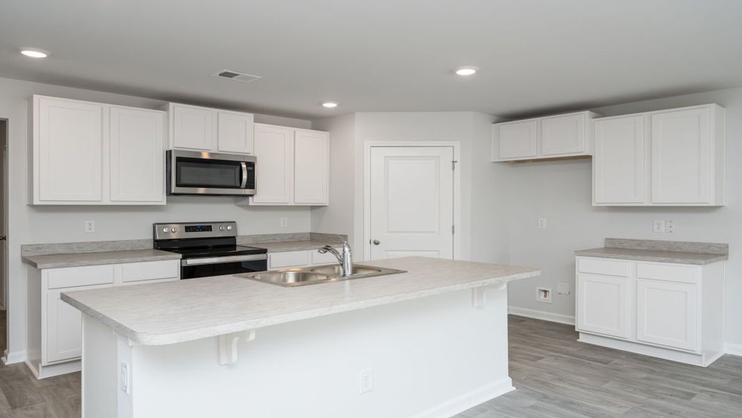 Representative furnished interior of a home built from the CALI by D.R. Horton in Jordanville Farms, Galivants Ferry (Image 8).