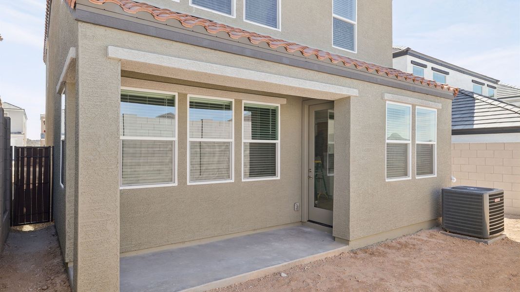 Exterior details and patio area of a home in The Buttes at Mystic, Peoria (Image 3).