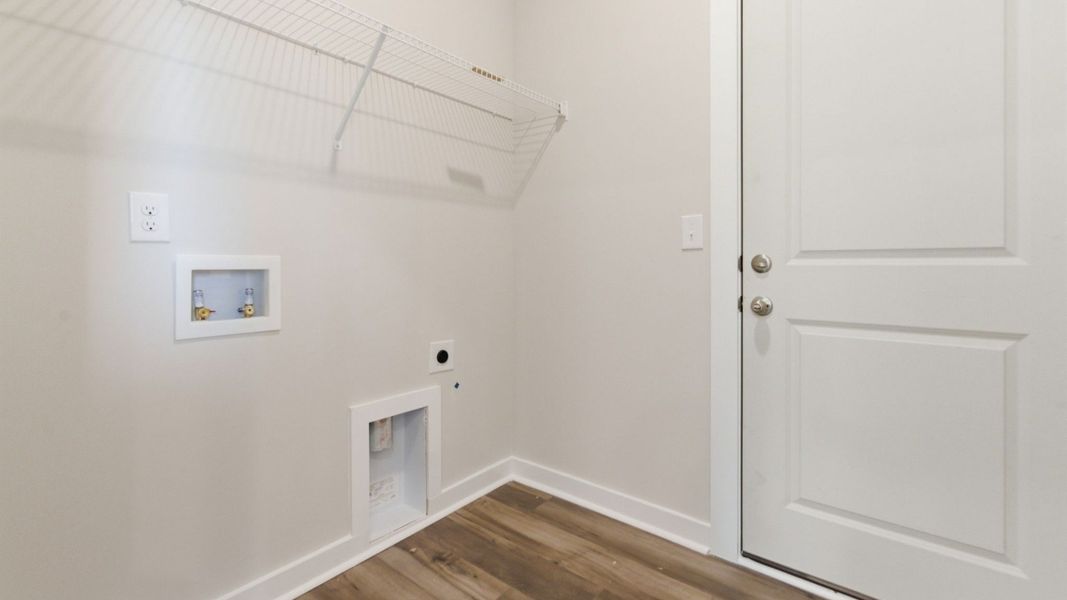 Laundry room with ventilated shelf