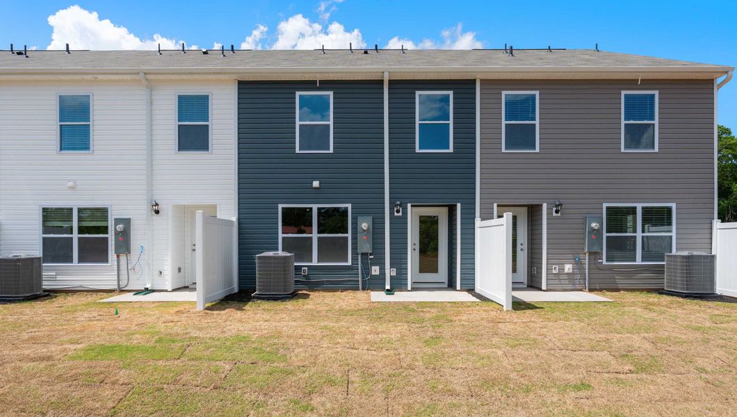 Front exterior of a new home in Chestnut Ridge Townhomes, Greenville, SC, highlighting curb appeal (Image 2). Front exterior of a new home in Chestnut Ridge Townhomes, Greenville, SC, highlighting curb appeal (Image 2).